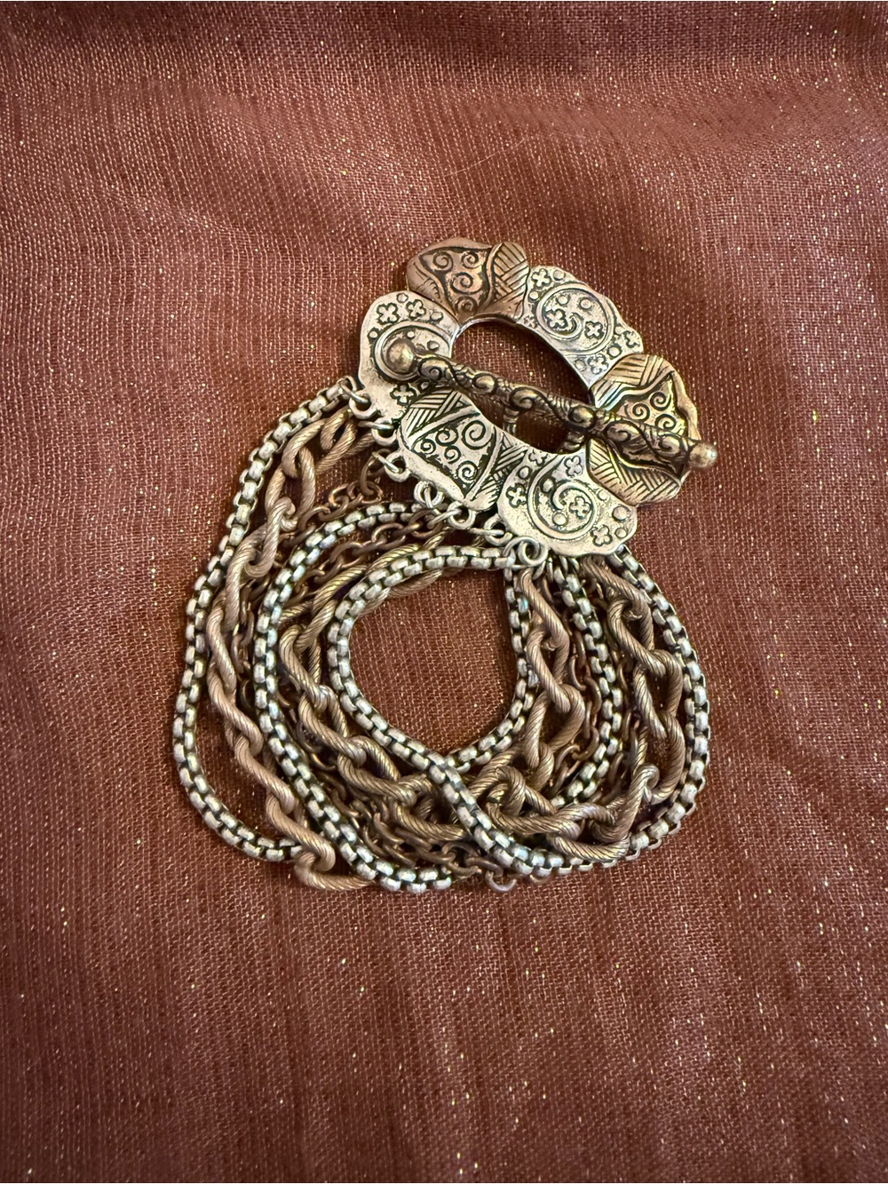 Vintage-Inspired Gold Tone Multi-Chain bracelet with Ornate Toggle Clasp